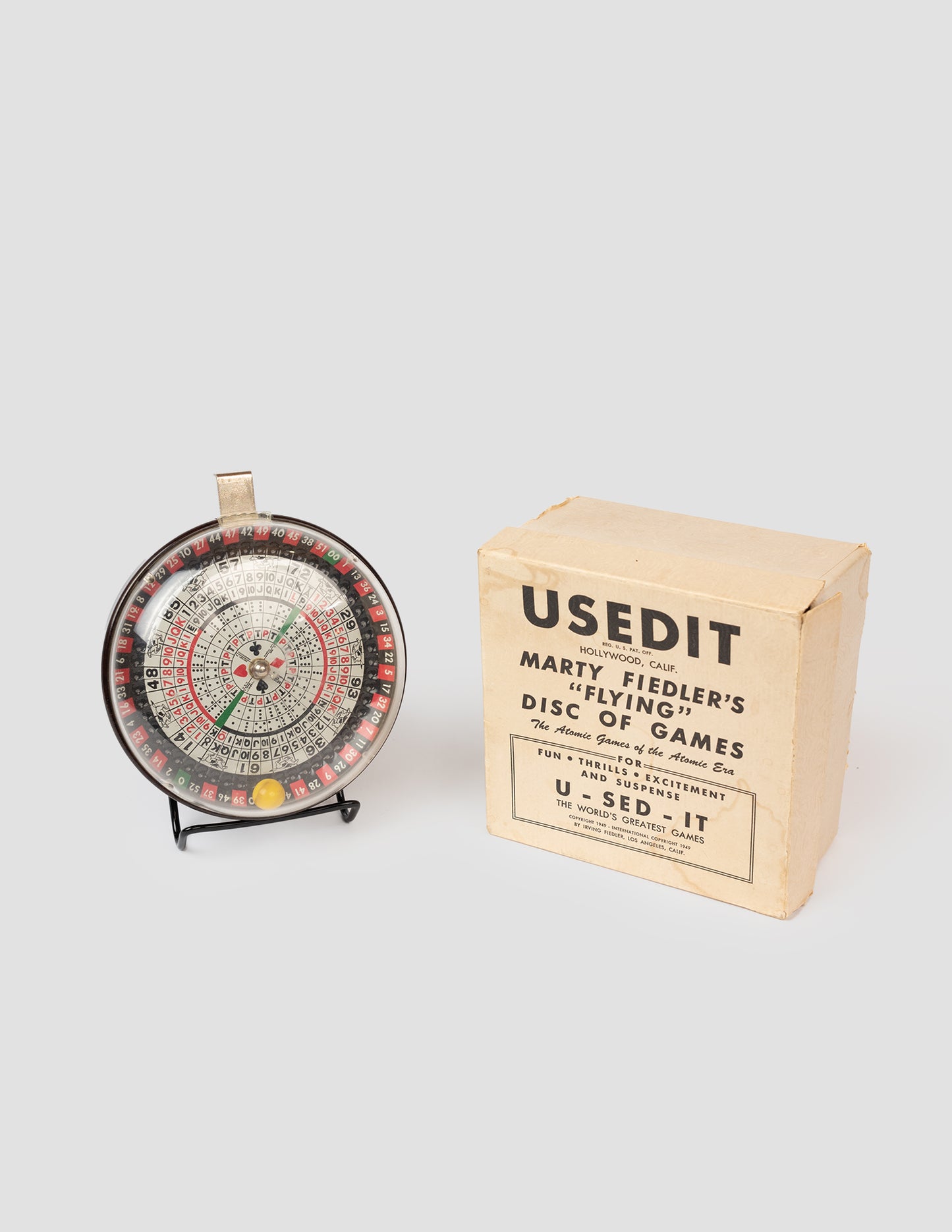 1940s Tin Disc of Games Toy