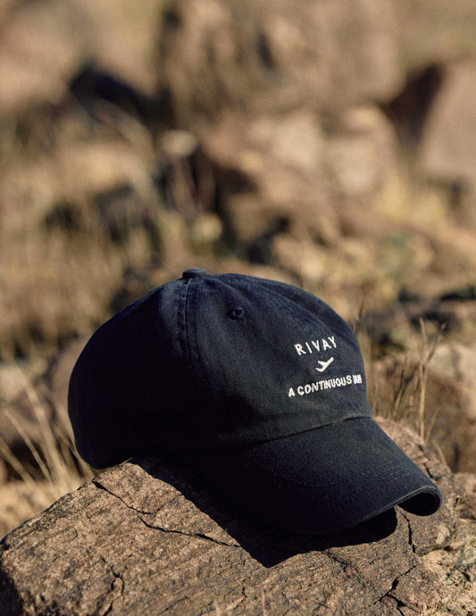 Rivay & A Continuous Lean Hat in Dark Navy