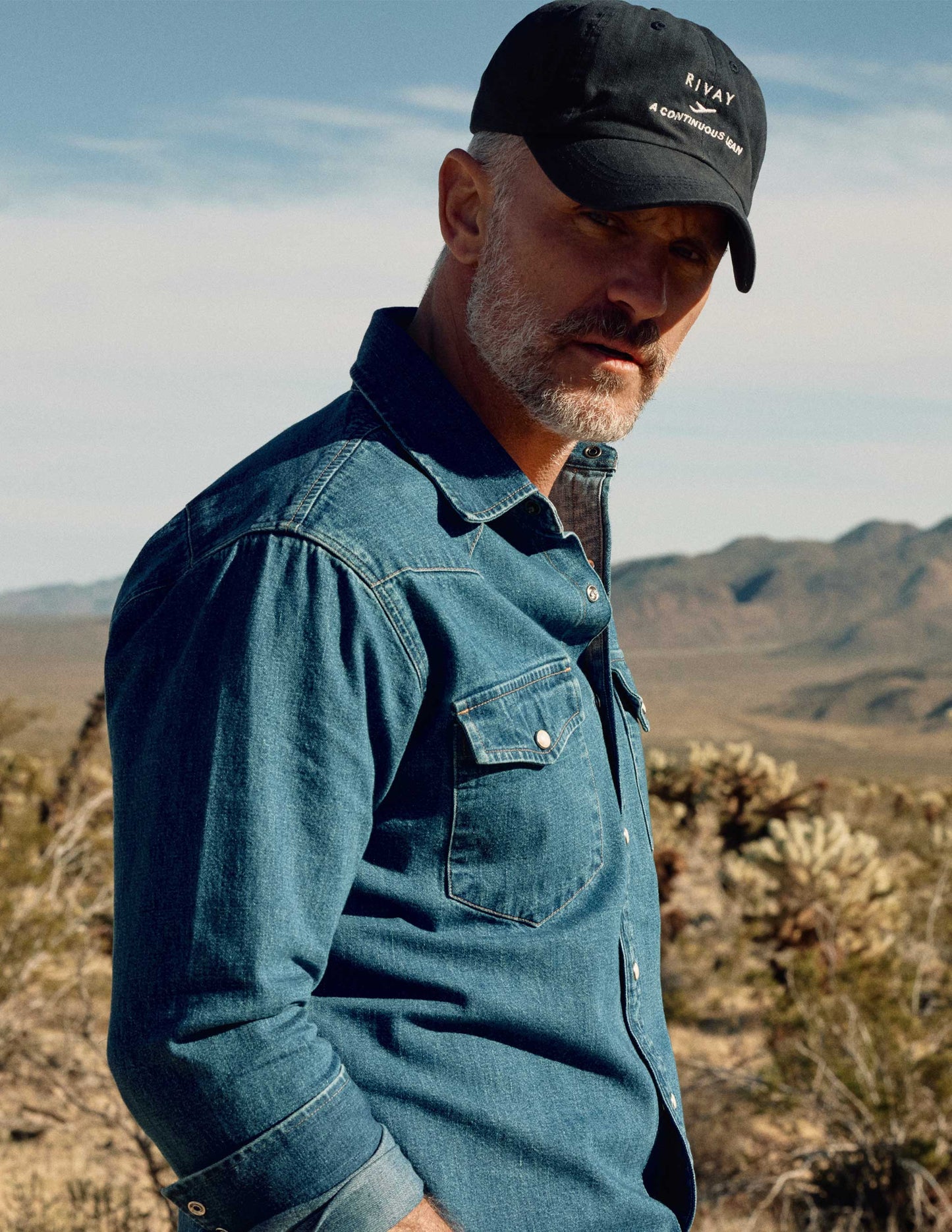 Rivay & A Continuous Lean Hat in Dark Navy