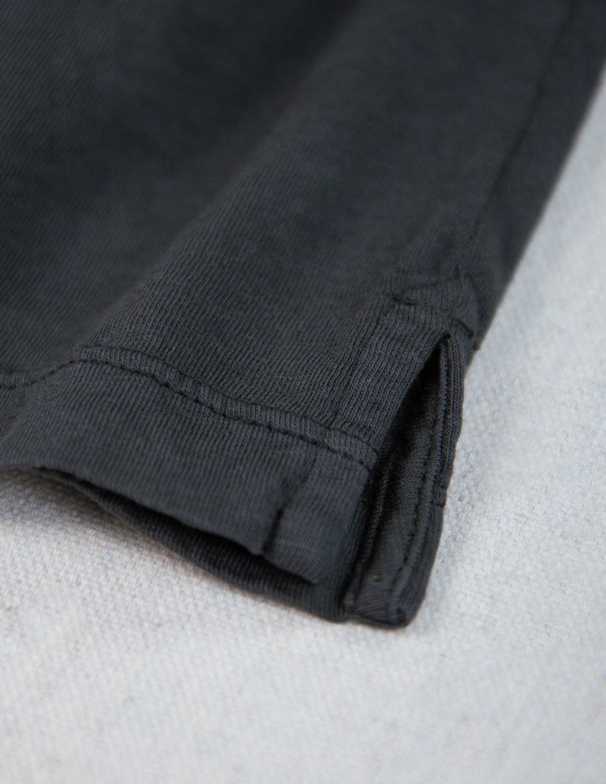 Garment Dyed Slub Jersey Polo in Faded Black