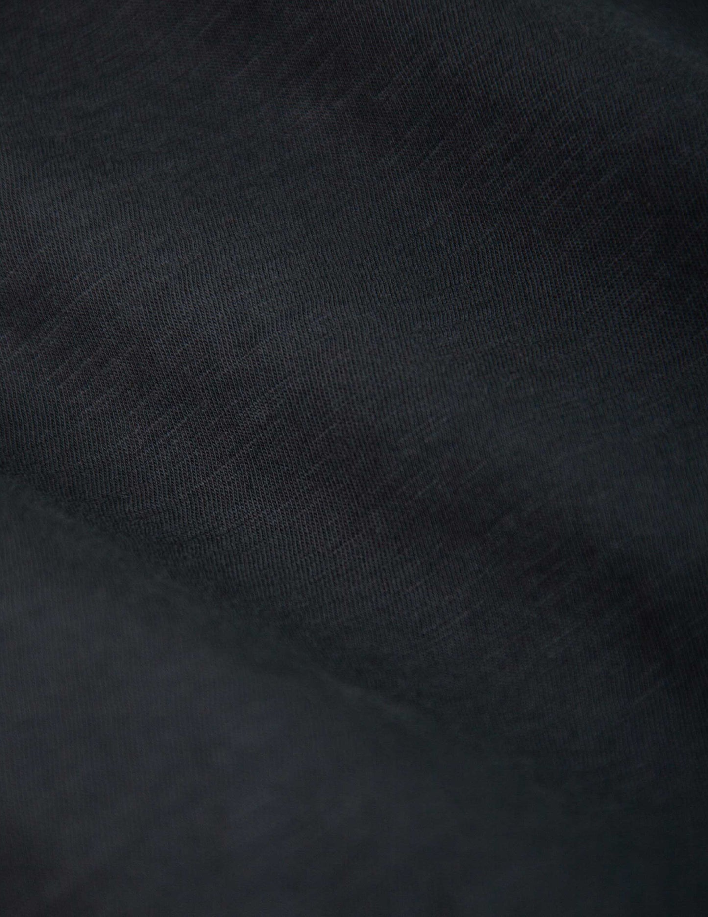 Garment Dyed Slub Jersey Polo in Faded Black