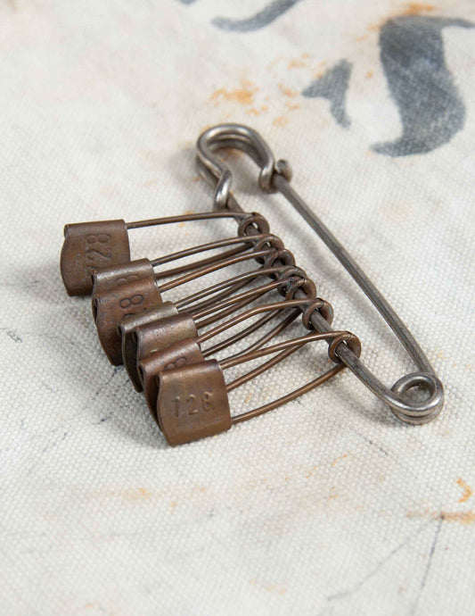 Vintage Safety Pin with Seven Numbered Gear Pins